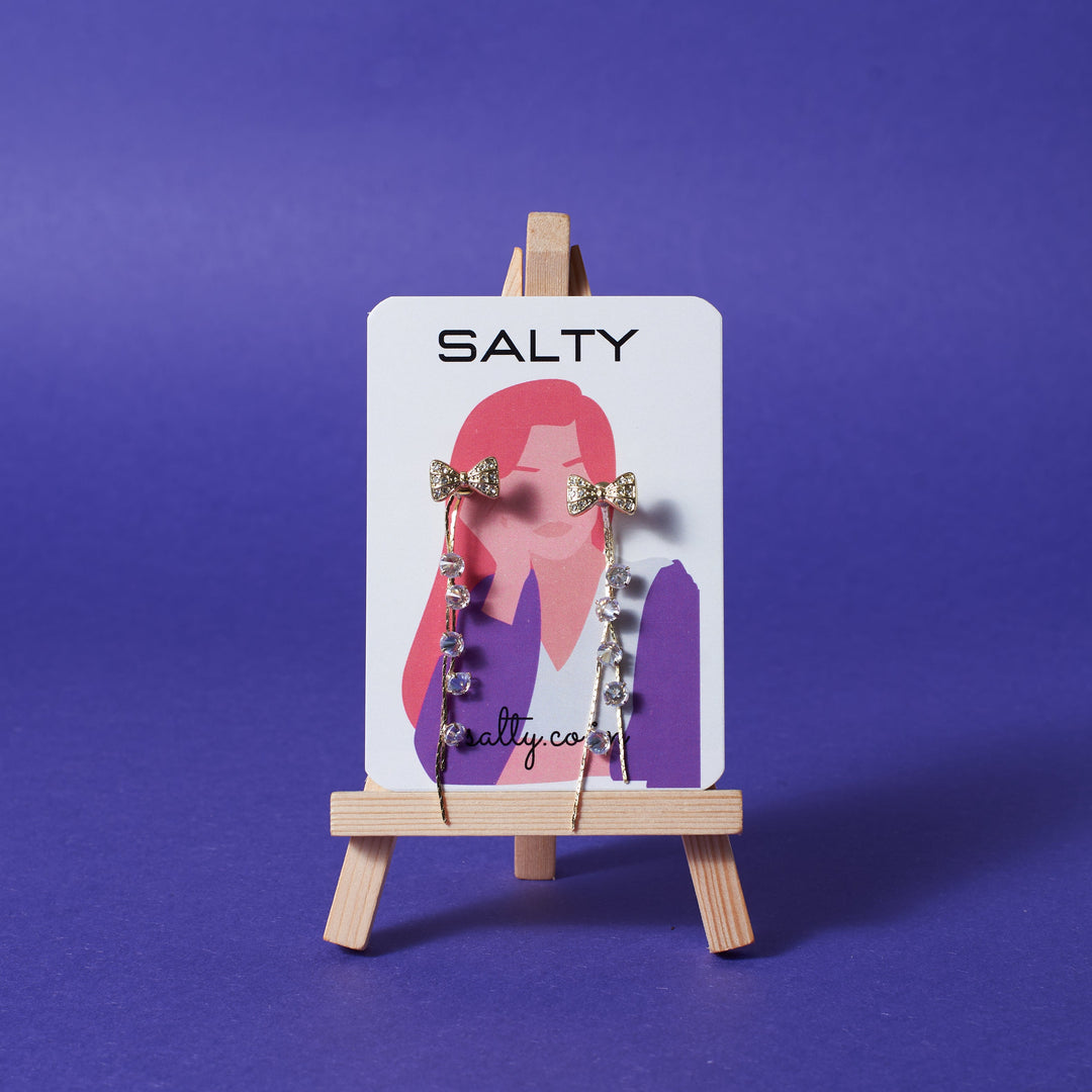 Lusty Bow Tassel Earrings