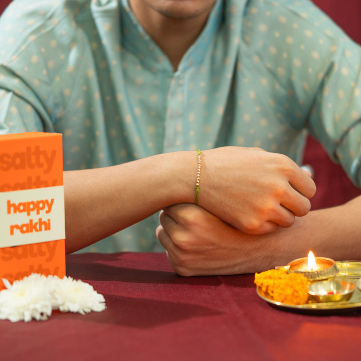 Golden Motif Minimal Bandhan Rakhi For Bhaiya