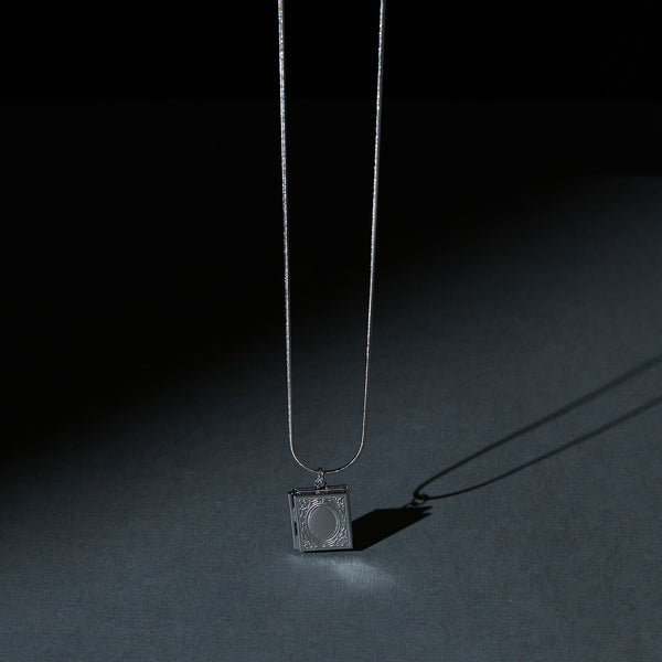 Quirky Quasar Openable Silver Pendant