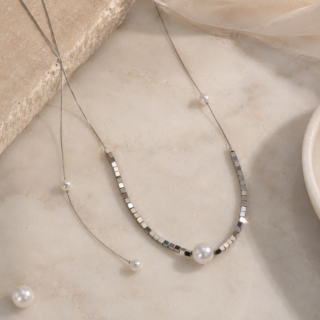 Shimmering Love Knot Pearl Necklace