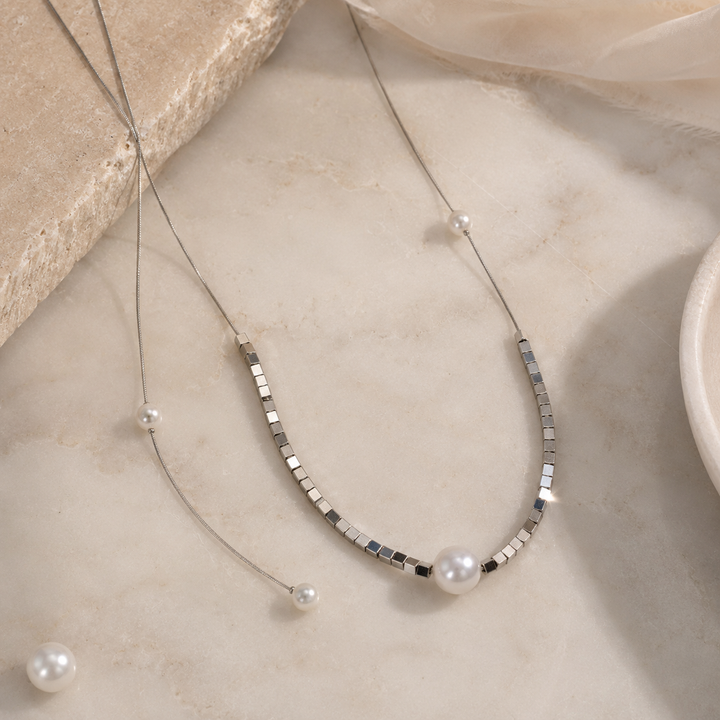 Shimmering Love Knot Pearl Necklace