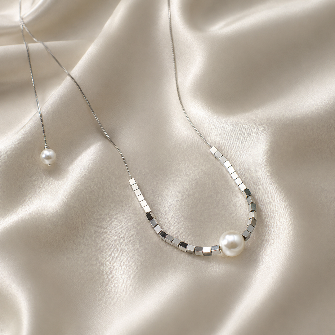 Shimmering Love Knot Pearl Necklace