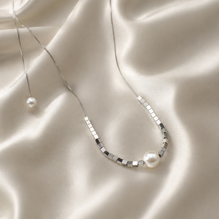 Shimmering Love Knot Pearl Necklace