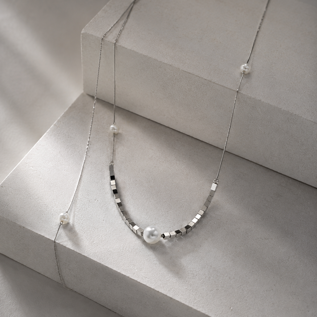 Shimmering Love Knot Pearl Necklace