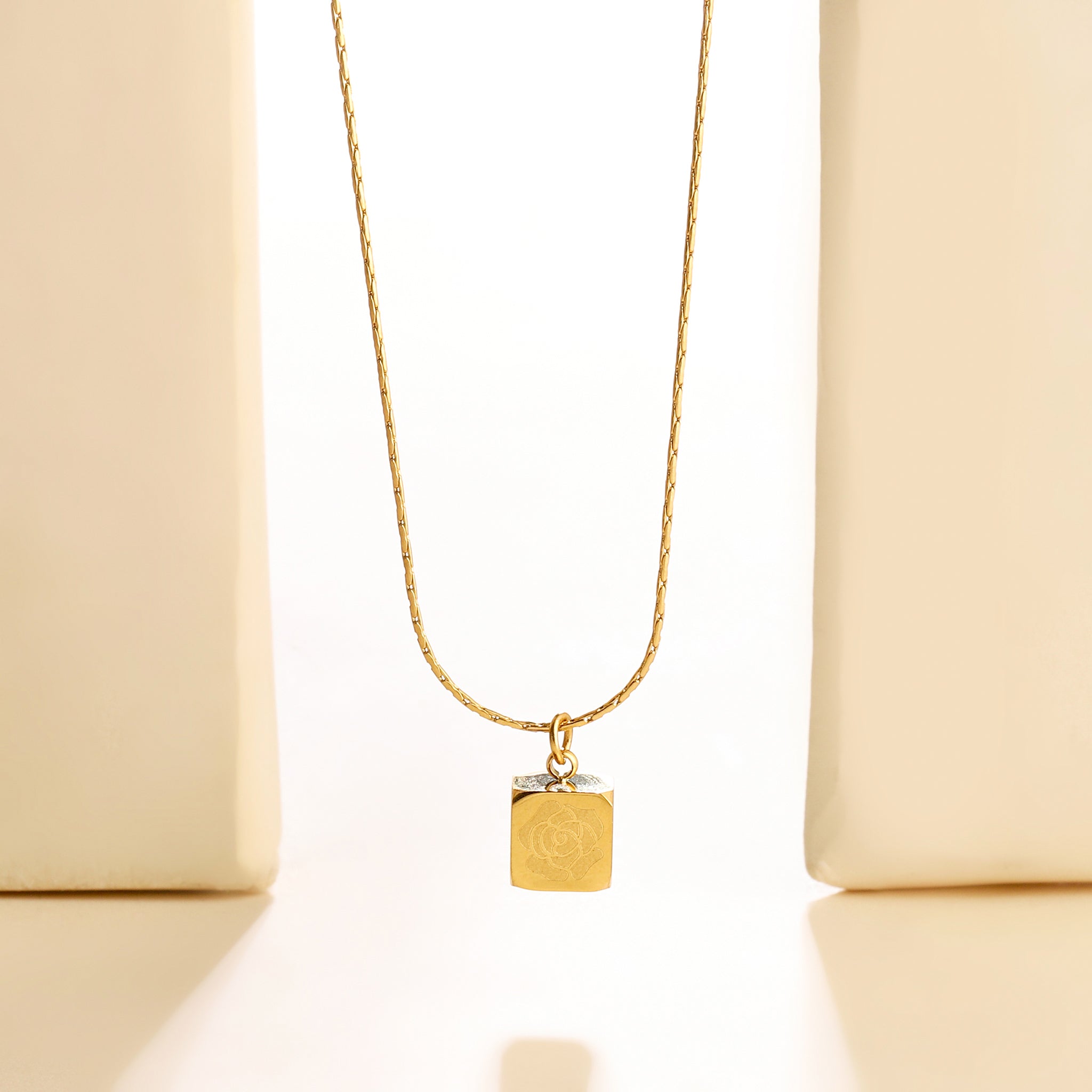 Lithe Rose Charm Gold Reversible Necklace | Salty – Salty Accessories