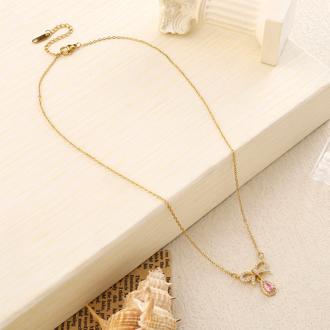 Amersa Pink Bow Drop Necklace