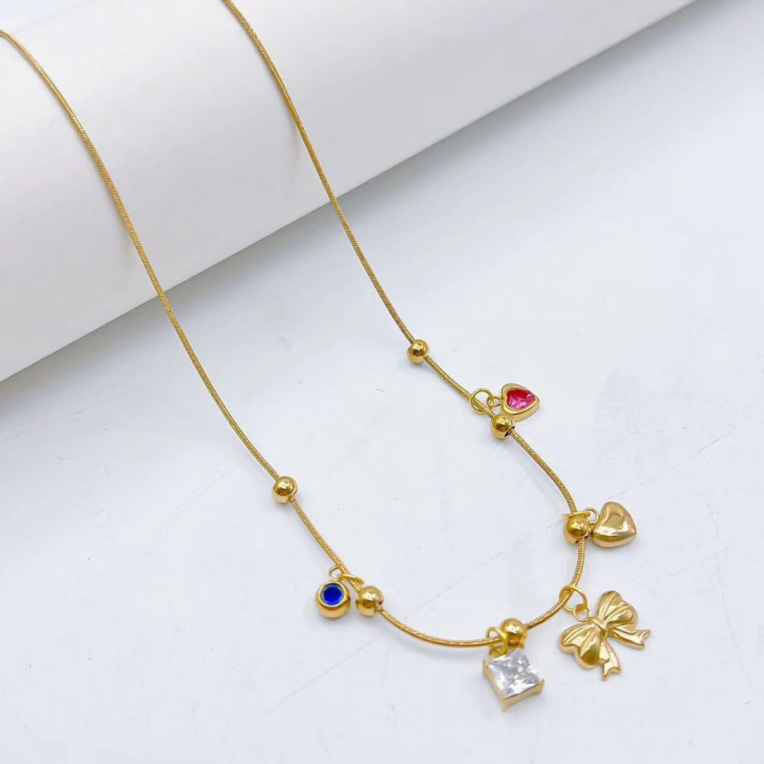 Golden Keepsake Bow Necklace