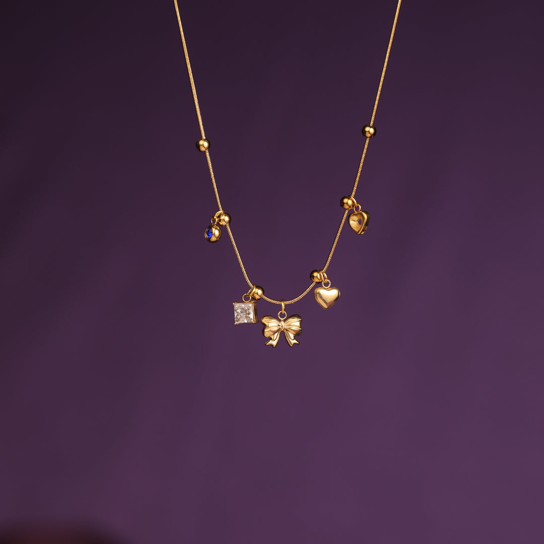 Golden Keepsake Bow Necklace