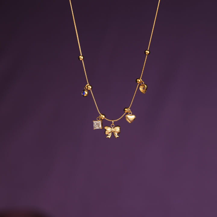Golden Keepsake Bow Necklace
