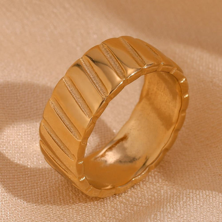 Golden Groove Ribbed Statement Band Ring