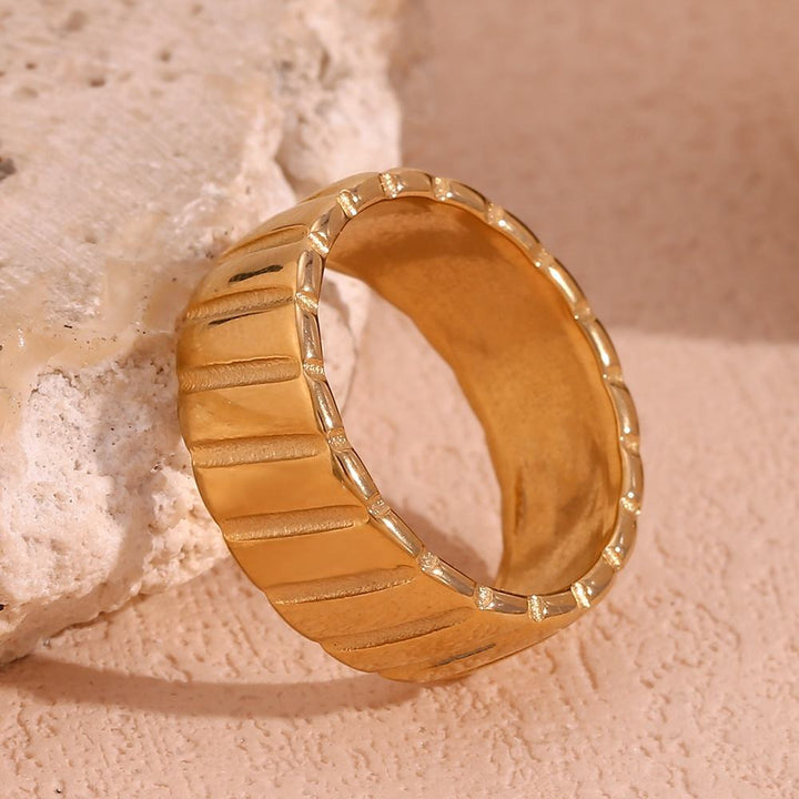 Golden Groove Ribbed Statement Band Ring
