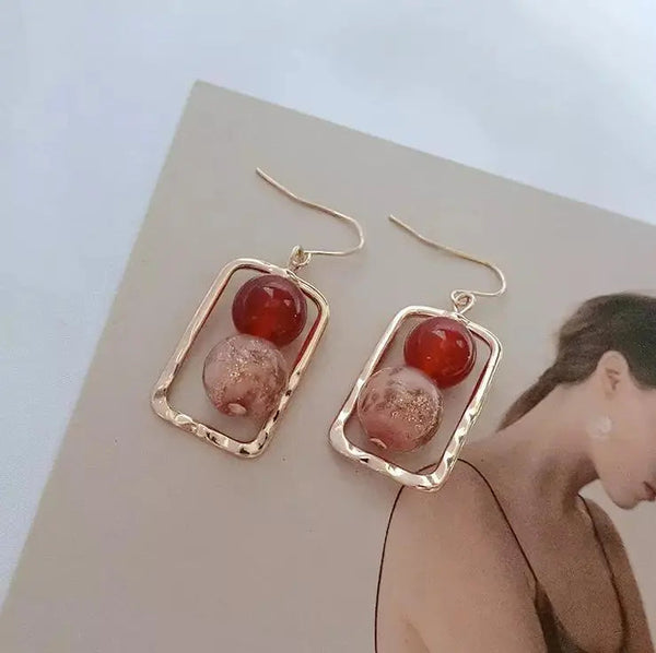 Red Transfer Stone Gold Lined Earrings
