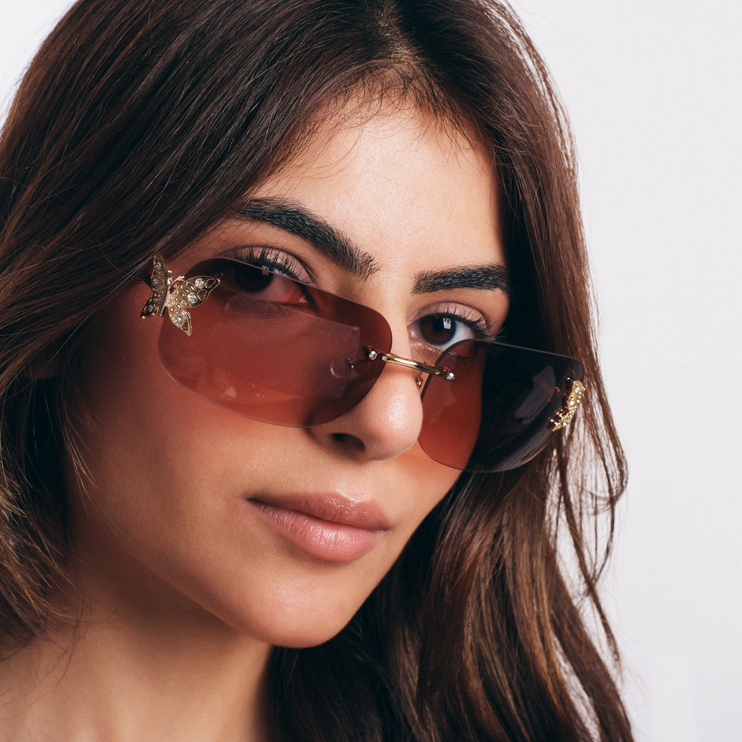 Butterfly Accent UV400 Protection Rimless Sunglasses - Brown