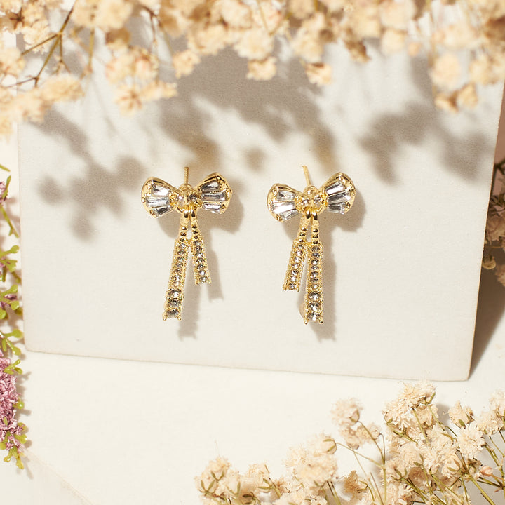 Gold Shine Ribbon Bow Earrings Salty