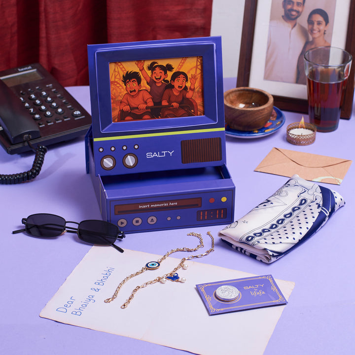 The Couple Edit Rakhi TV Gift Hamper For Bhaiya and Bhabhi