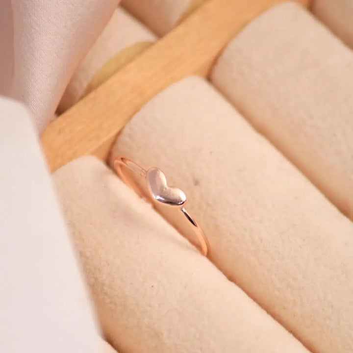 Solid heart charm gold ring