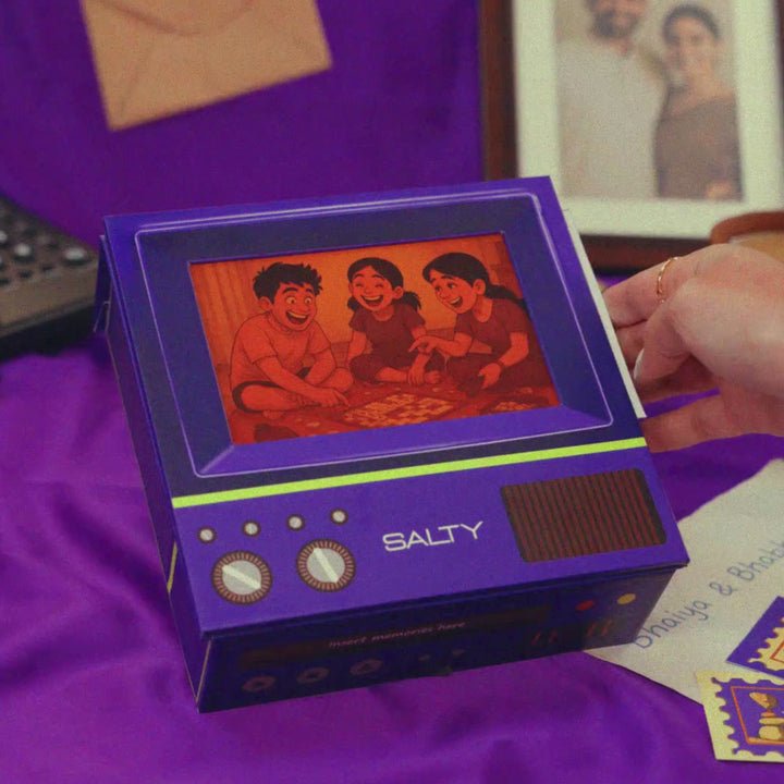 The Couple Edit Rakhi TV Gift Hamper For Bhaiya and Bhabhi