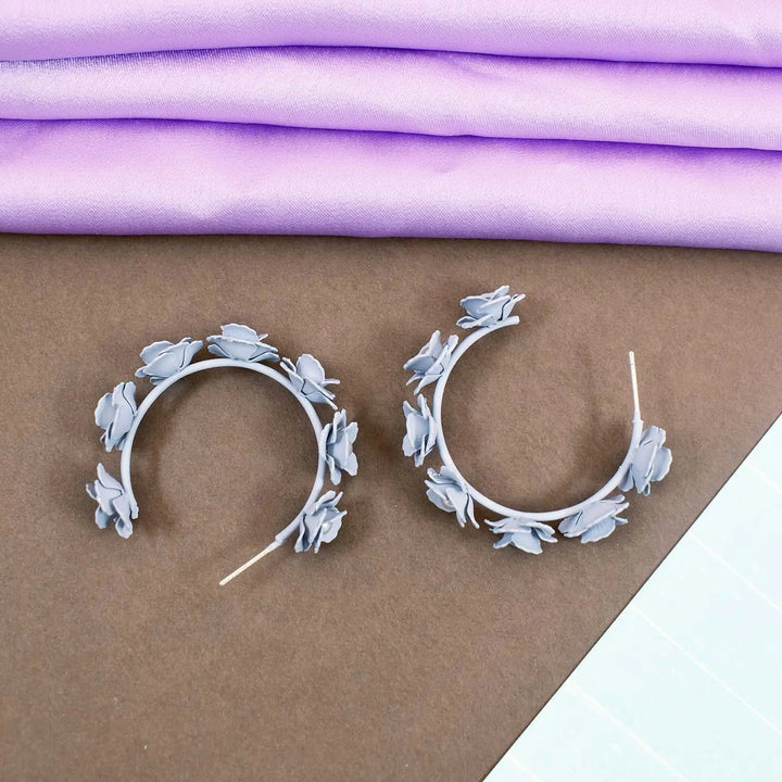 Acrylic bluish-grey flower hoop earrings