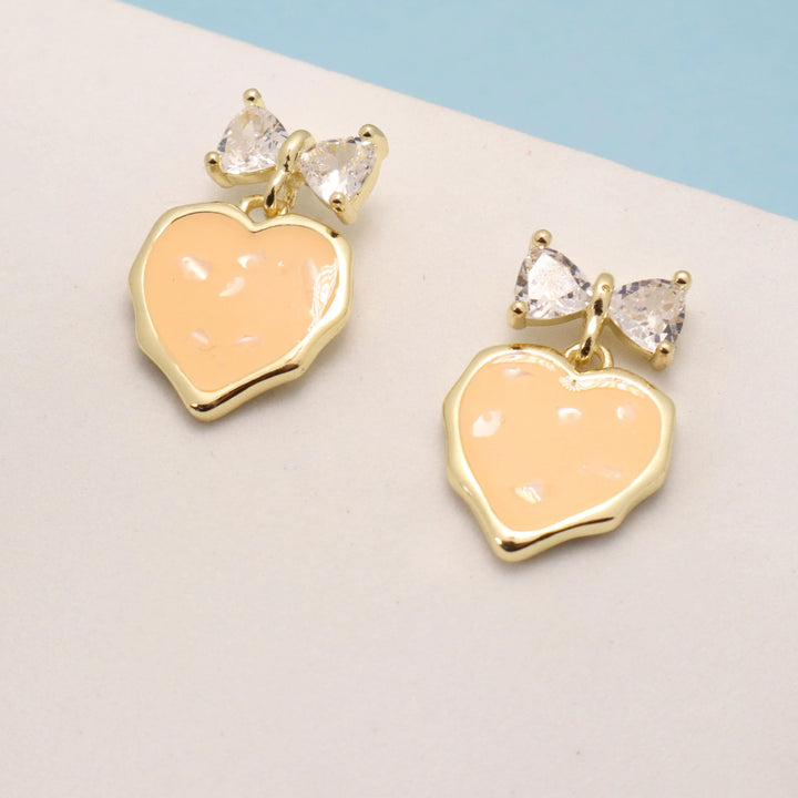 Cantaloupe Heart Bow Earrings