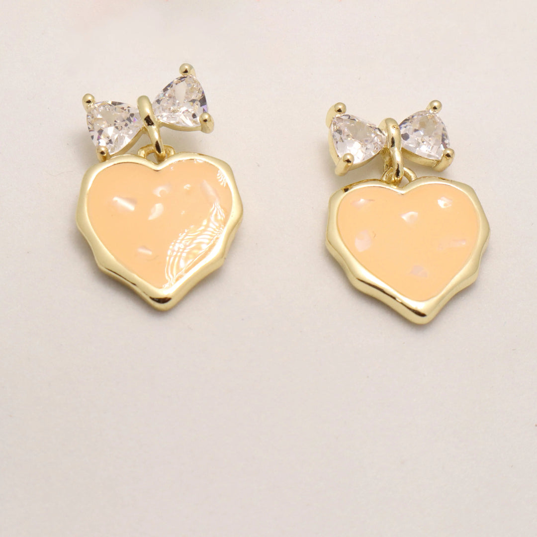 Cantaloupe Heart Bow Earrings