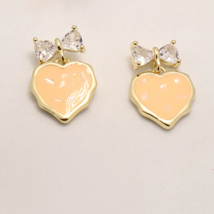 Cantaloupe Heart Bow Earrings