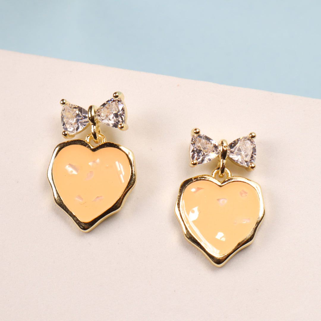 Cantaloupe Heart Bow Earrings
