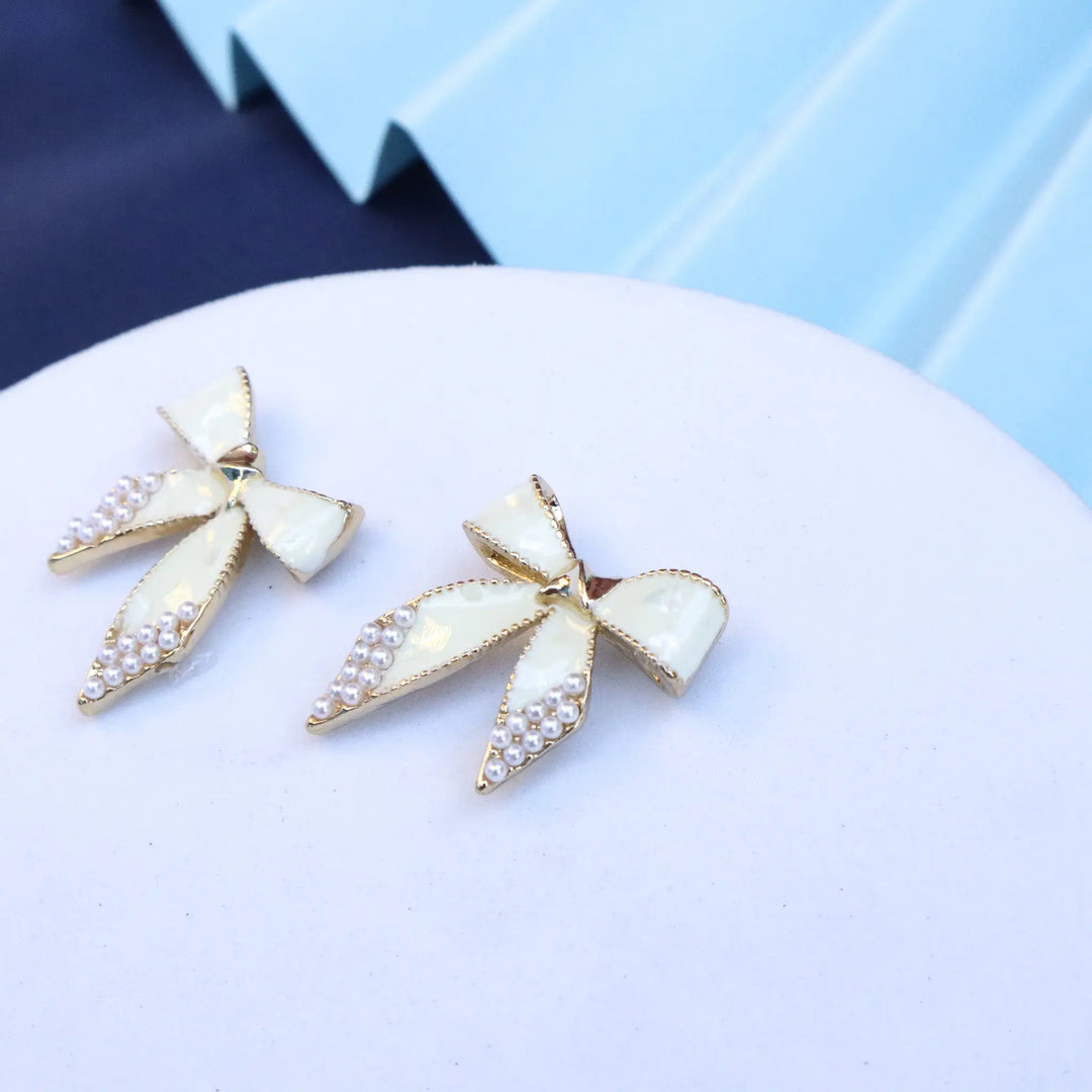 Cream Bow Earrings