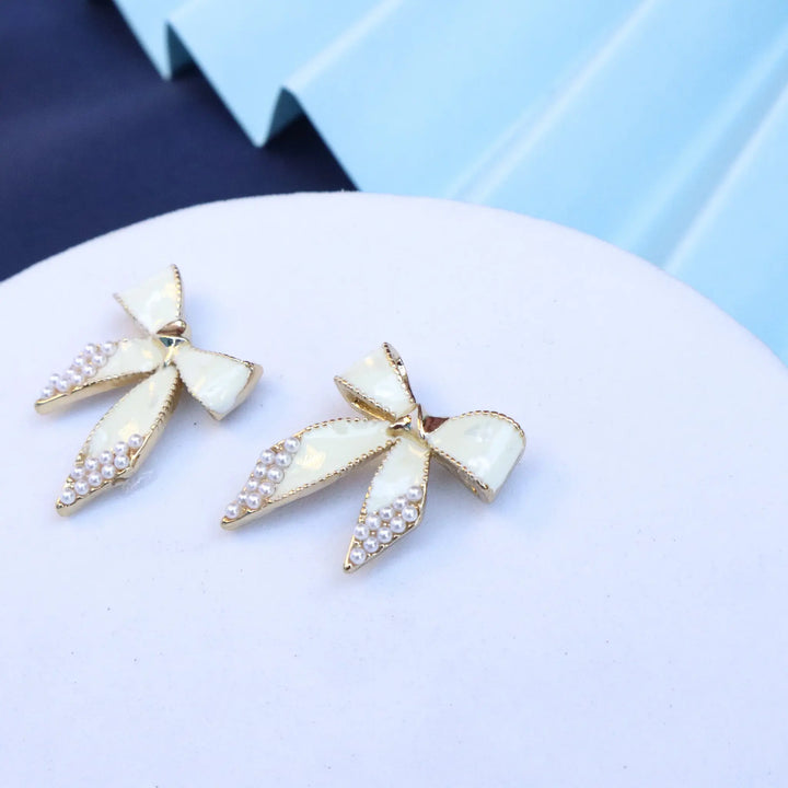Cream Bow Earrings