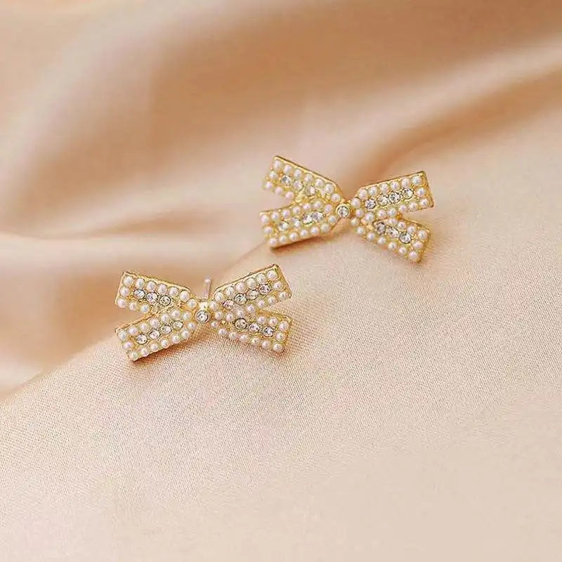 Cross Bow Diamond Studs