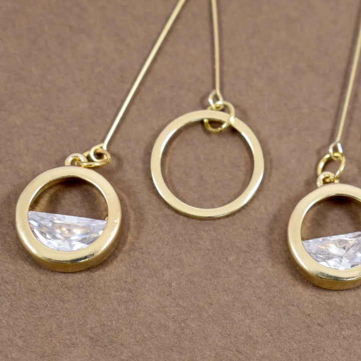Crystal detail gold ring drop earrings