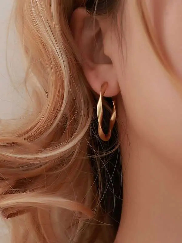 Gold Shine Twisted Round Hoop Earrings