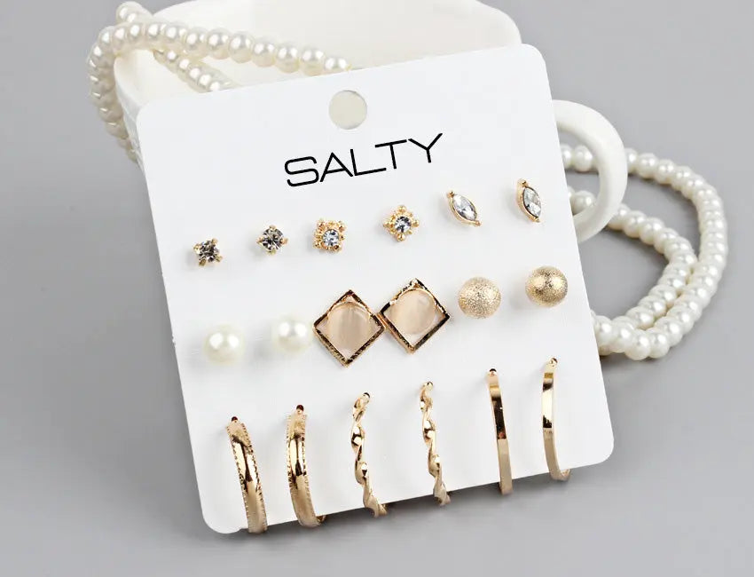 Set of Gold Huggie Hoop Earrings and Studs