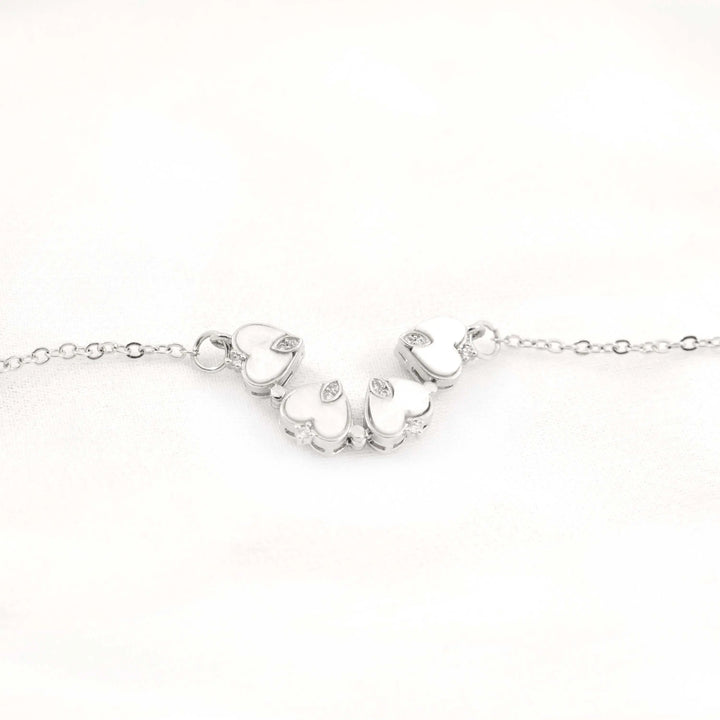 silver clover magnetic heart necklace